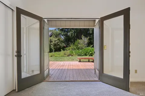 a backyard of a house with lots of green space
