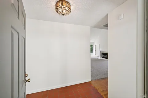 a view of a hallway with interior of the house