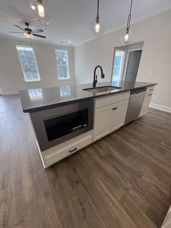 a view of empty room with windows