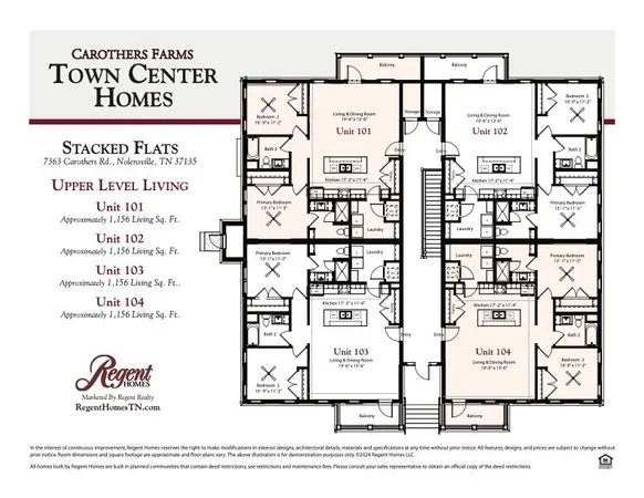a view of a kitchen with white cabinets