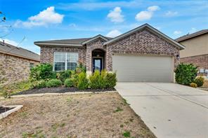 1609 Deodara Drive Cedar Park, TX 78613 - Photo 1 of 1 a front view of a house with a garden