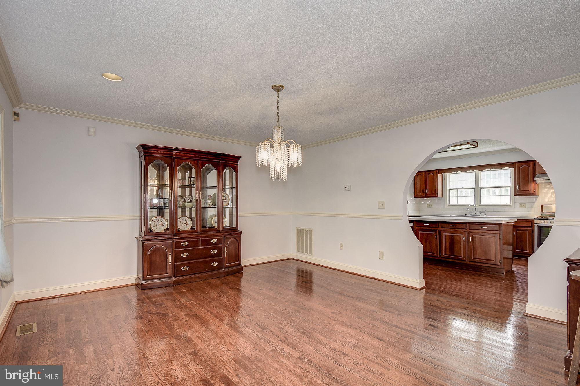 6413 Horseshoe Road Clinton, MD 20735 - Photo 5 of 30 Dining Room with beautiful hardwood floors.