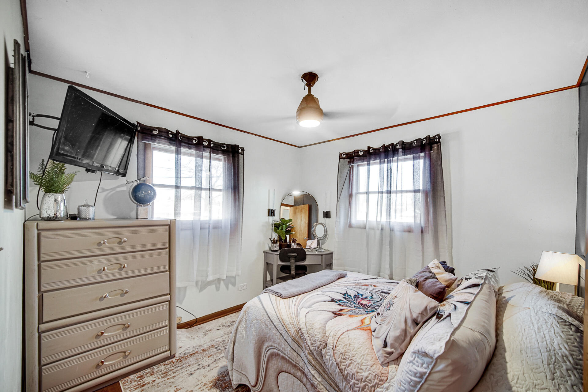 9503 Forrest Drive Highland, IN 46322 - Photo 12 of 19 a bedroom with a bed and a dresser