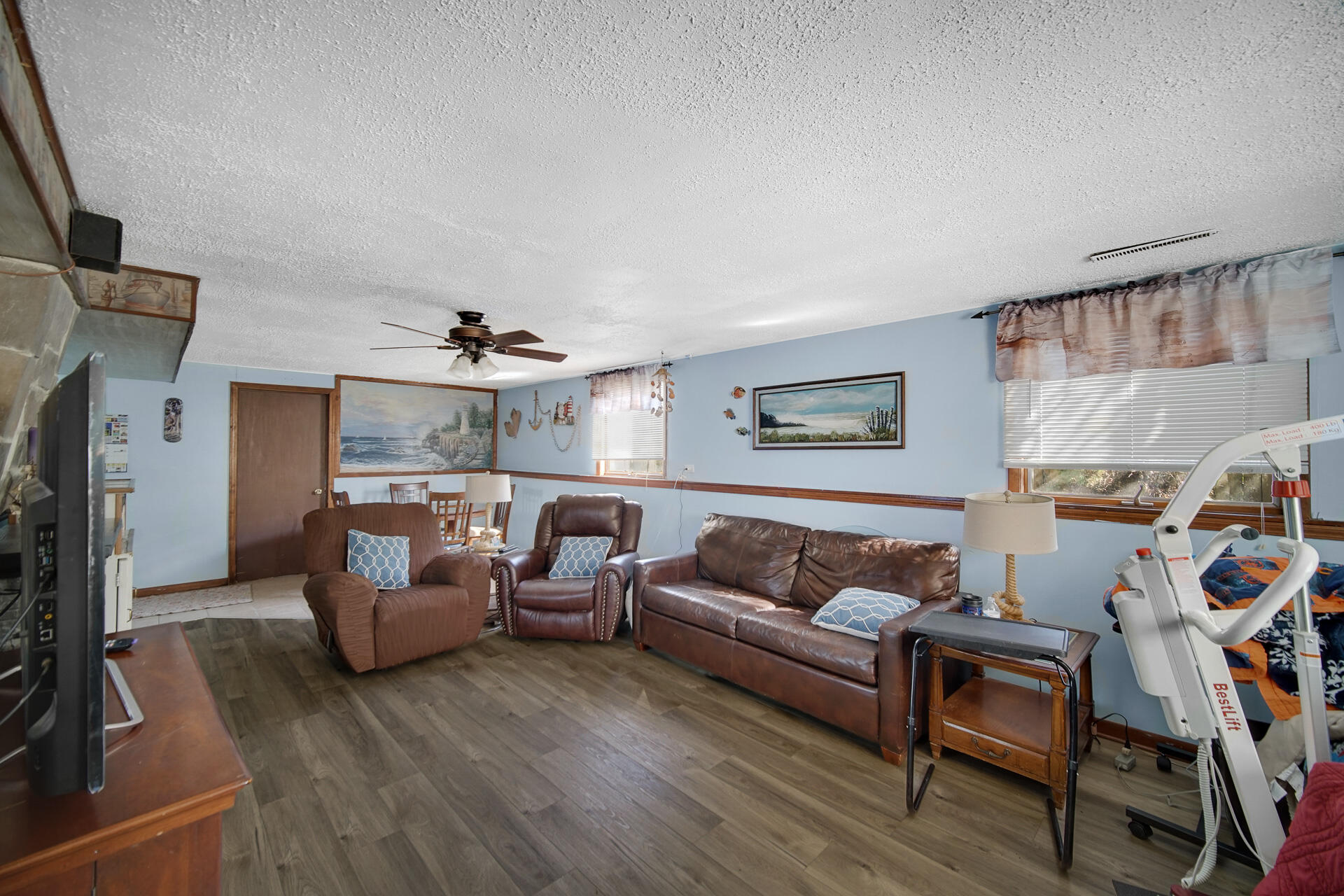 9503 Forrest Drive Highland, IN 46322 - Photo 15 of 19 a living room with furniture and a flat screen tv
