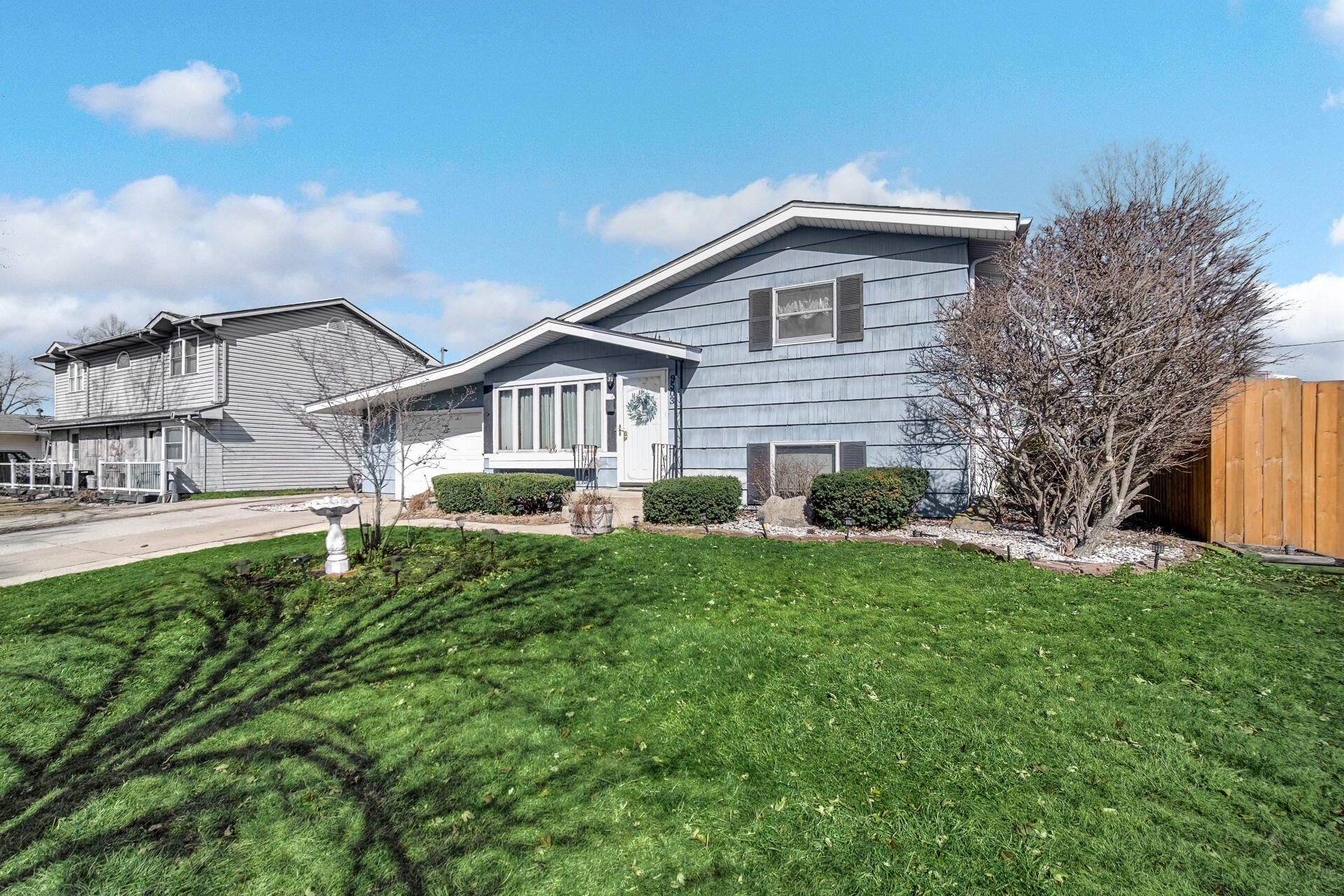 9503 Forrest Drive Highland, IN 46322 - Photo 2 of 19 a house view with a garden space