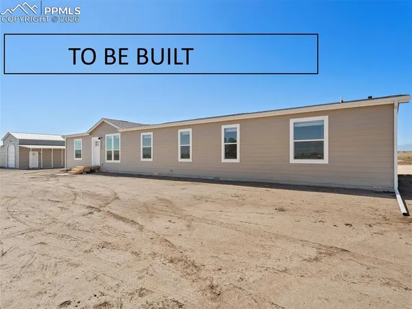 a view of house with yard