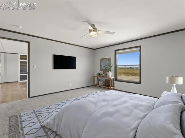 a view of an empty room with a window