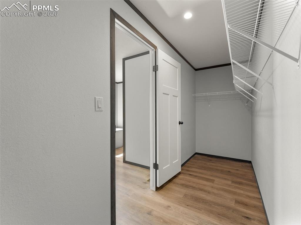 2820 East Ellicott Road South Calhan, CO 80808 - Photo 24 of 39 a view of hallway with wooden floor