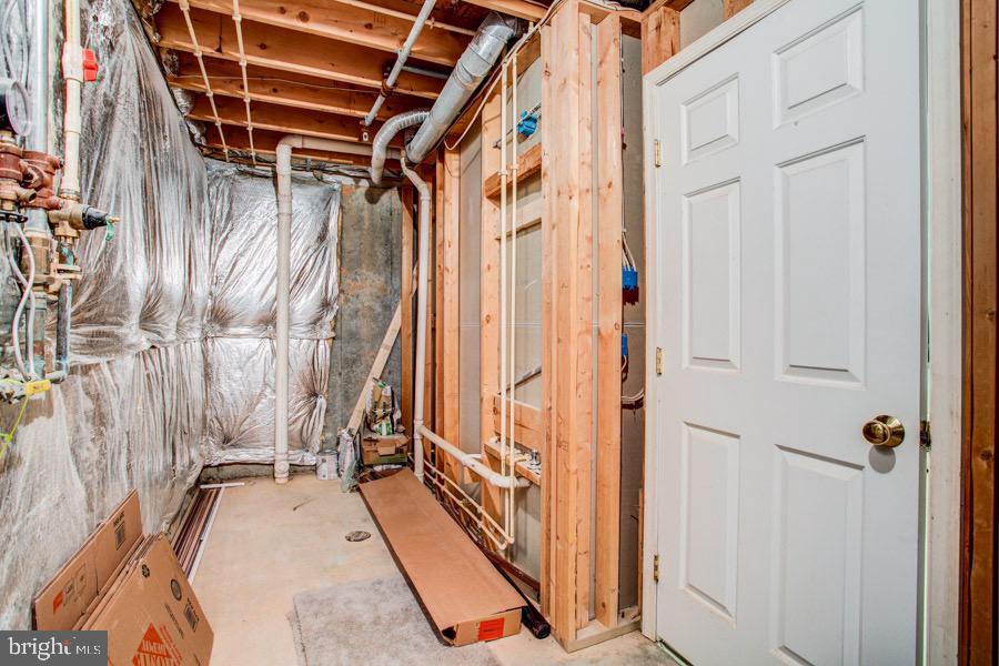 5036 Finsbury Road Baltimore, MD 21237 - Photo 27 of 34 a view of a walk in closet