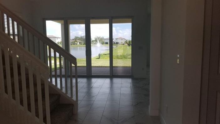 4739 Saddle Ranch Road, Unit 216 Lake Worth, FL 33467 - Photo 6 of 7 interior back yard water view
