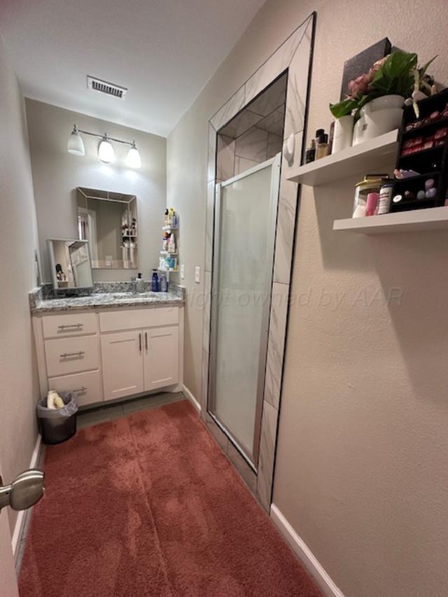 500 Poplar Dumas, TX 79029 - Photo 8 of 13 a kitchen with sink cabinets and refrigerator