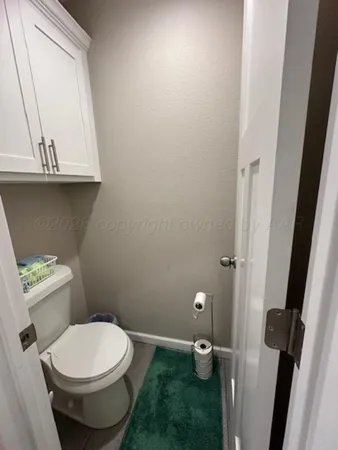 a bathroom with a toilet