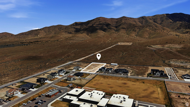 2930 Jojo Road, Unit 110 Eagle Mountain, UT 84005 - Photo 6 of 22 View of property location with a mountain backdrop and nearby suburban area