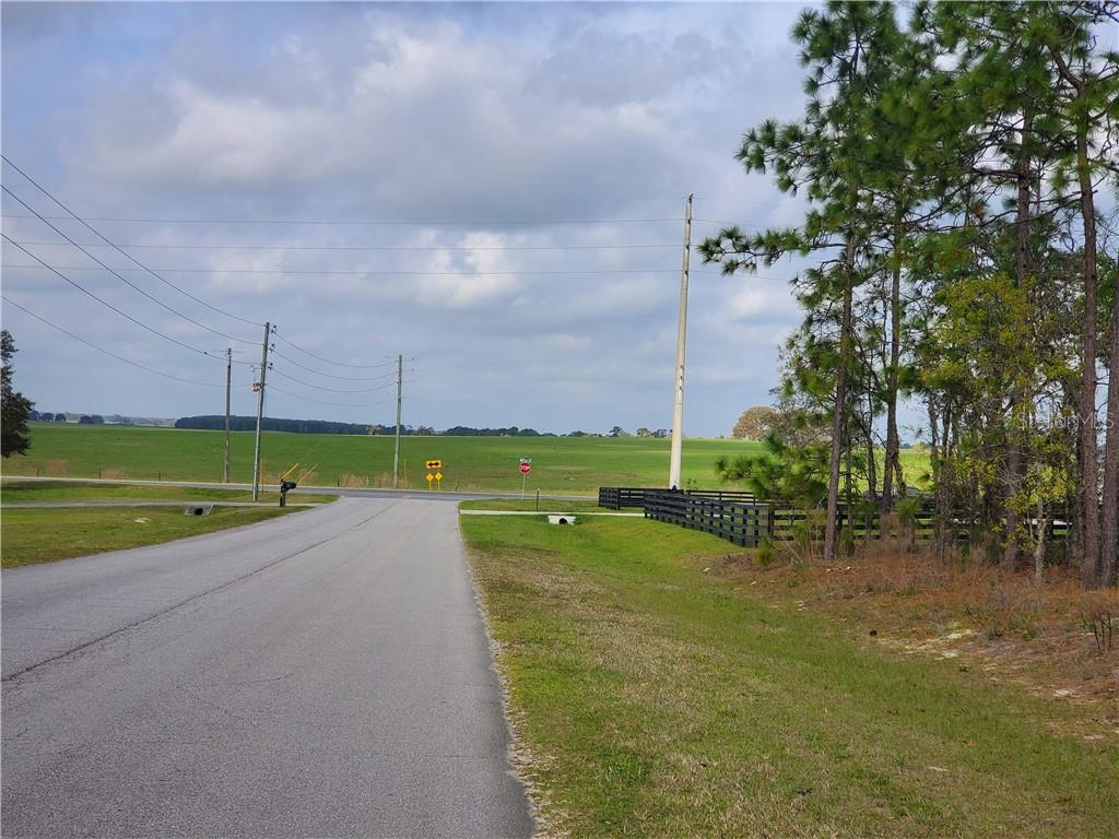 Tbd Southwest 66 Street Ocala, FL 34481 - Photo 1 of 1 Lot on the right before the fence. Looking west with 140 th Ave. at the stop sign