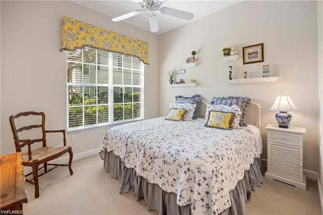 a bathroom with a sink toilet a mirror and shower