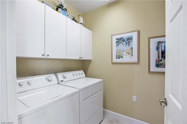 a view of a balcony with table and chairs