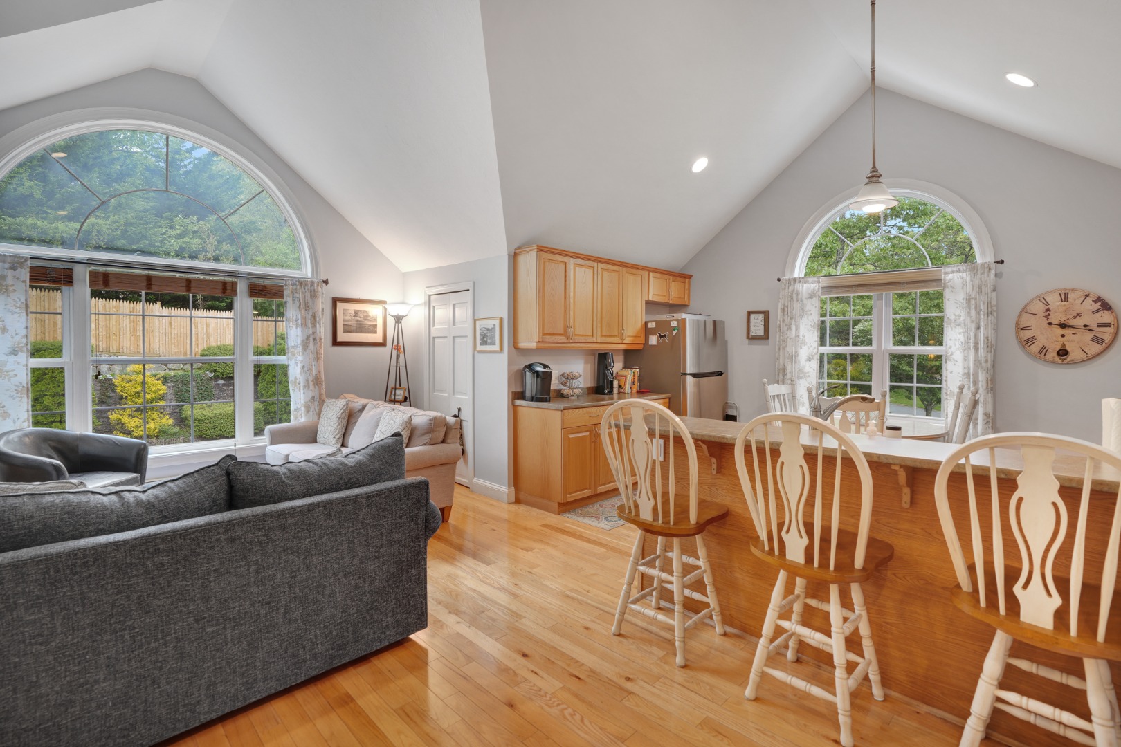 8 Fresh Pond Road Oak Bluffs, MA 02557 - Photo 16 of 36 a living room with furniture wooden floor and a large window