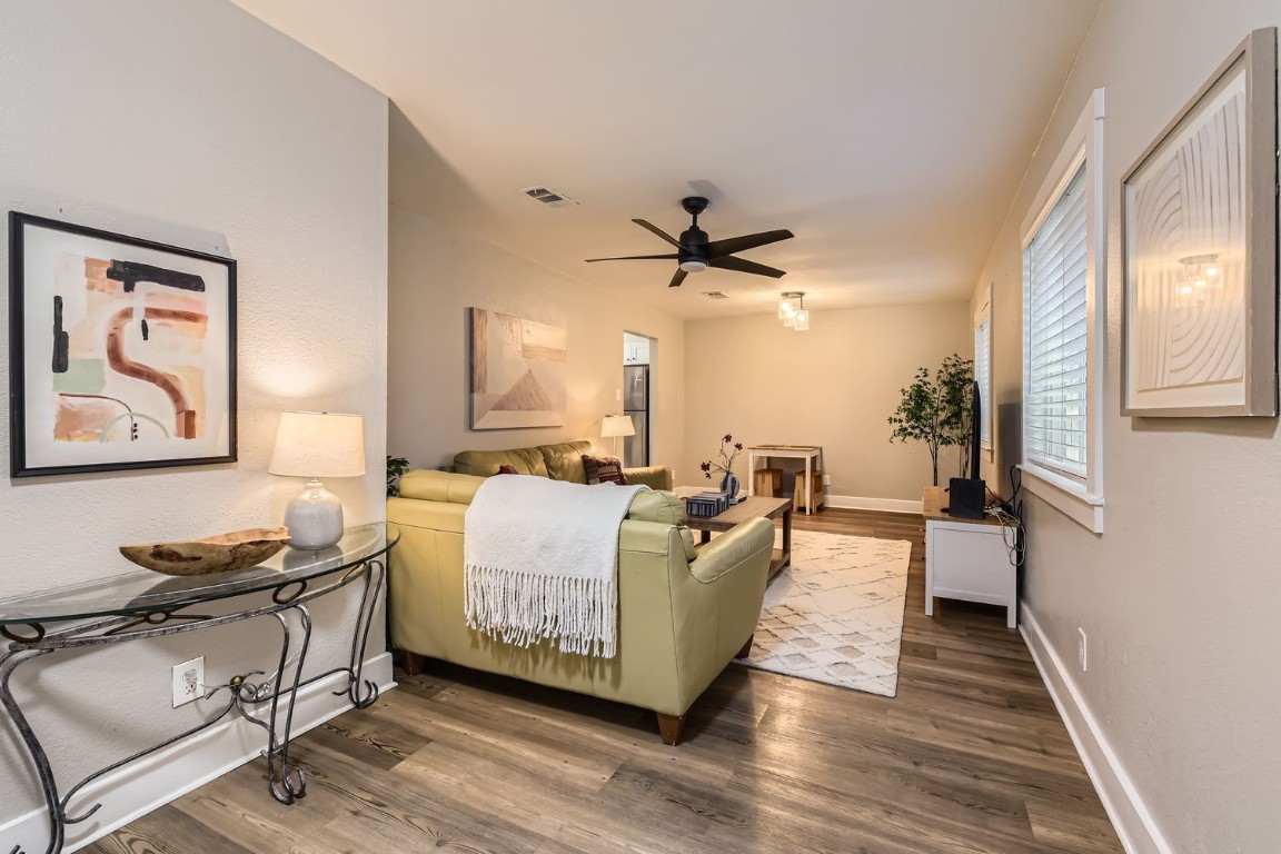 6108 Calmar Cove, Unit B Austin, TX 78721 - Photo 2 of 21 a living room with furniture and a large window