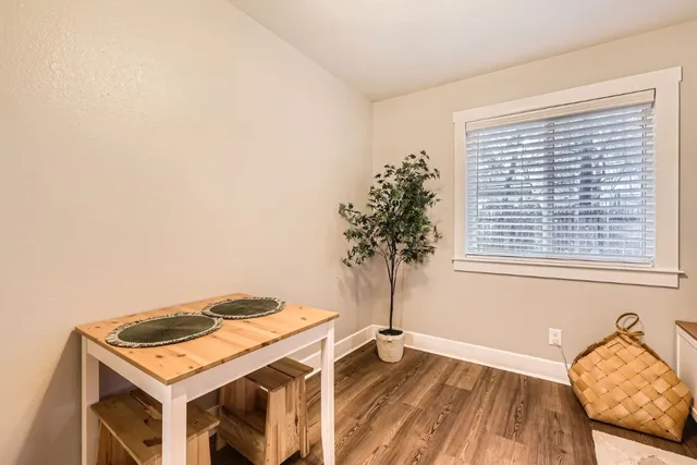 a workspace with furniture and window