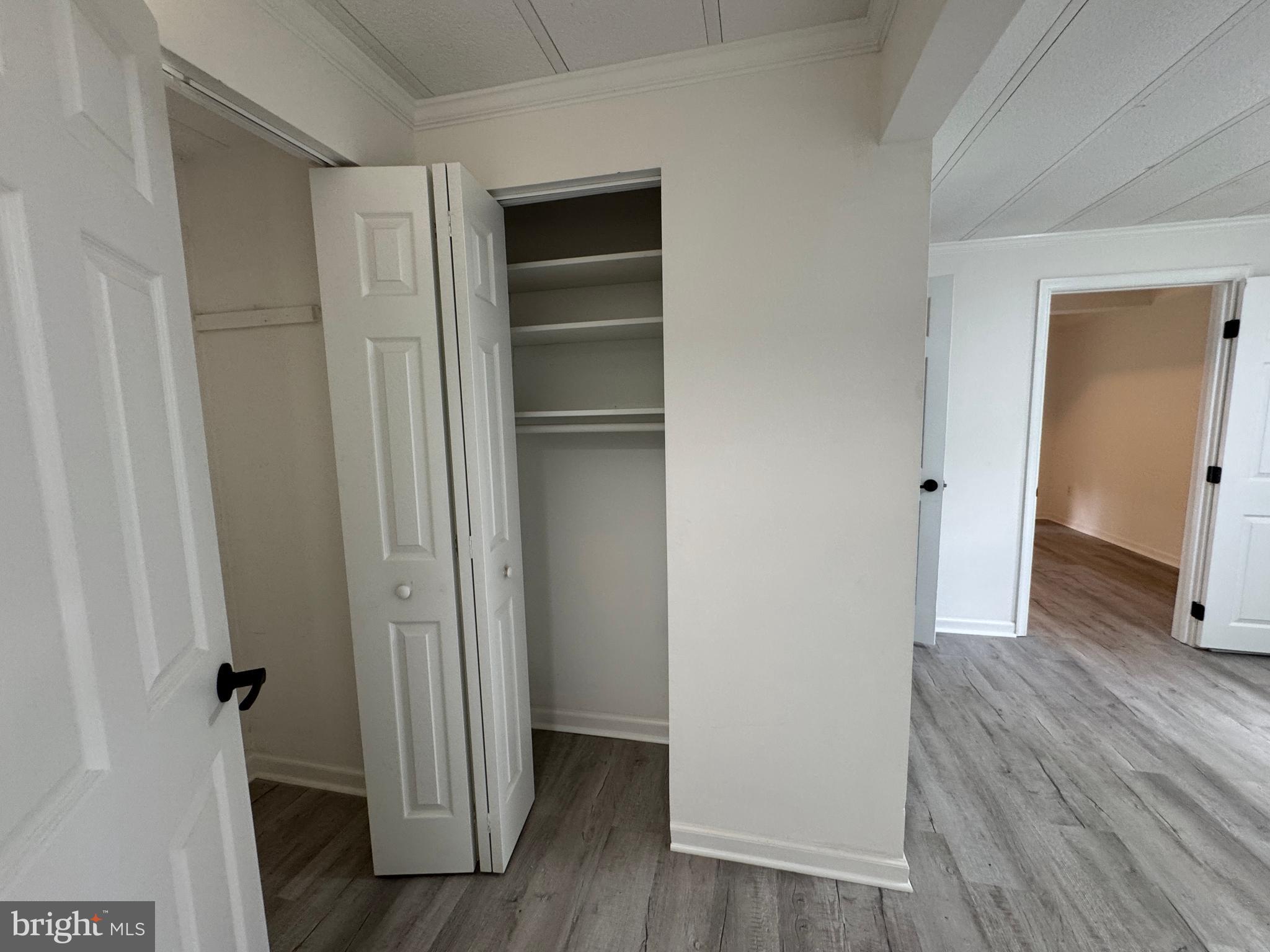 26374 Hill Road Ruther Glen, VA 22546 - Photo 18 of 31 a view of empty room with wooden floor
