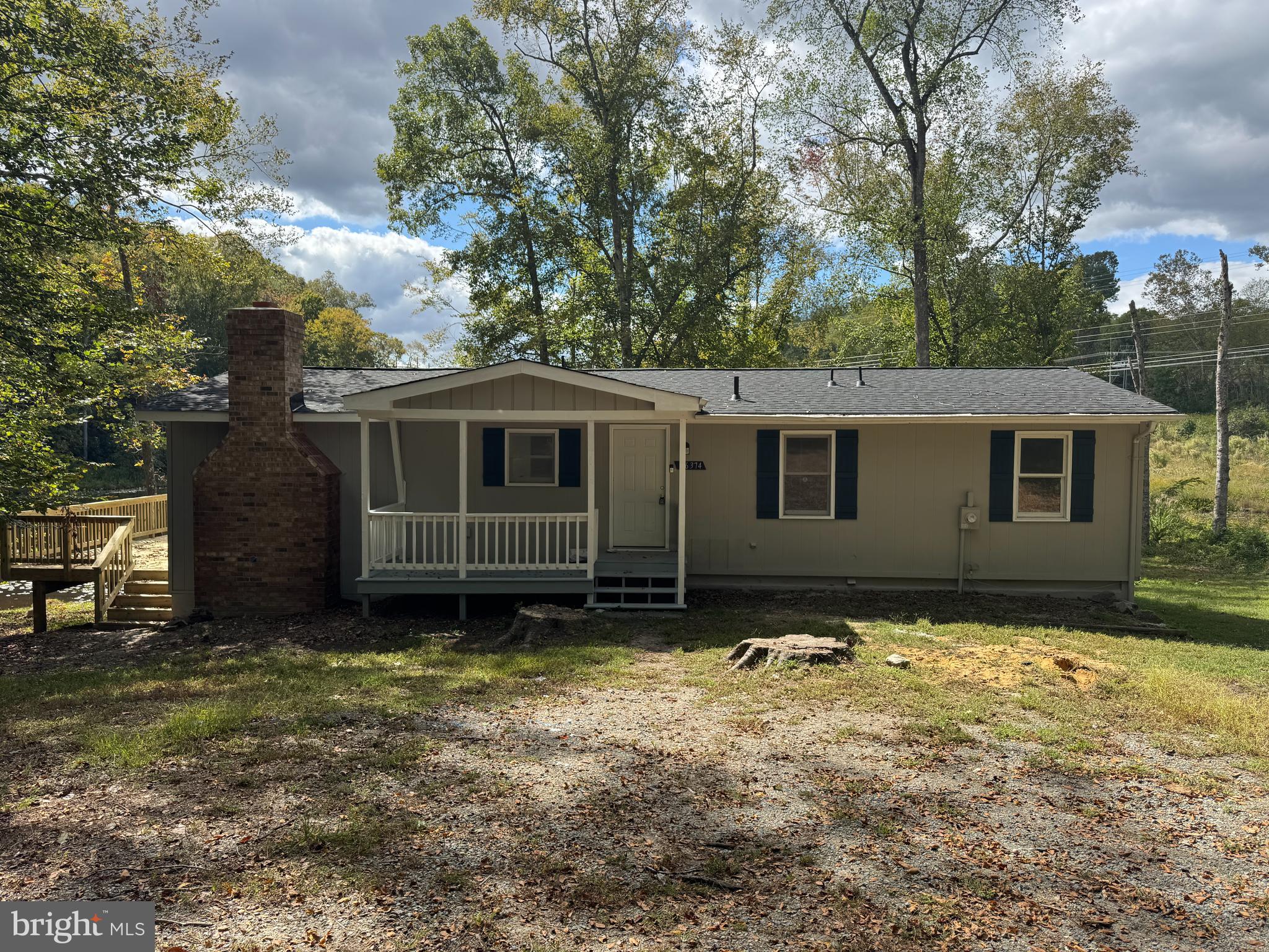 26374 Hill Road Ruther Glen, VA 22546 - Photo 26 of 31 a view of a house with a yard