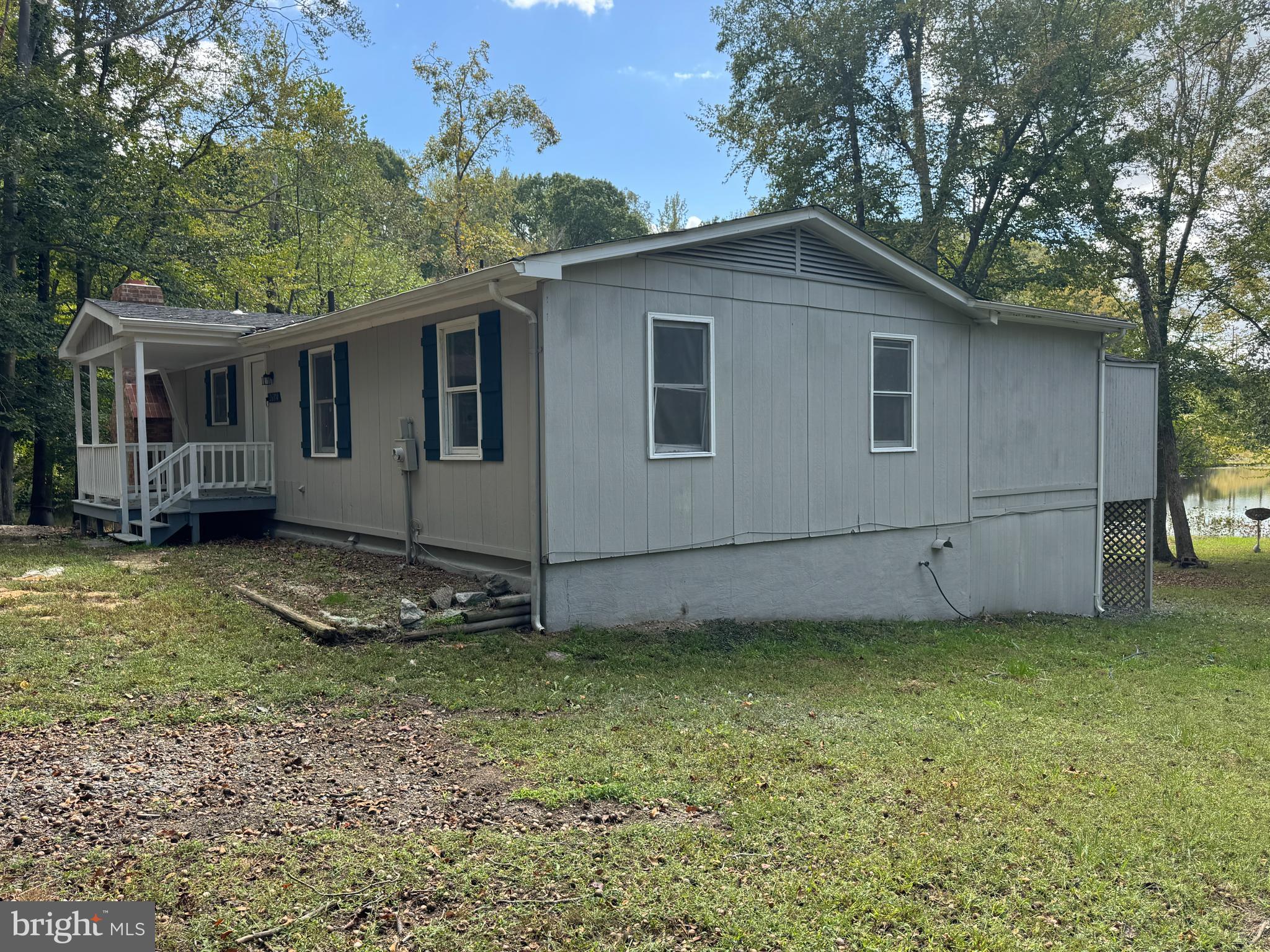26374 Hill Road Ruther Glen, VA 22546 - Photo 29 of 31 a house with trees in the background