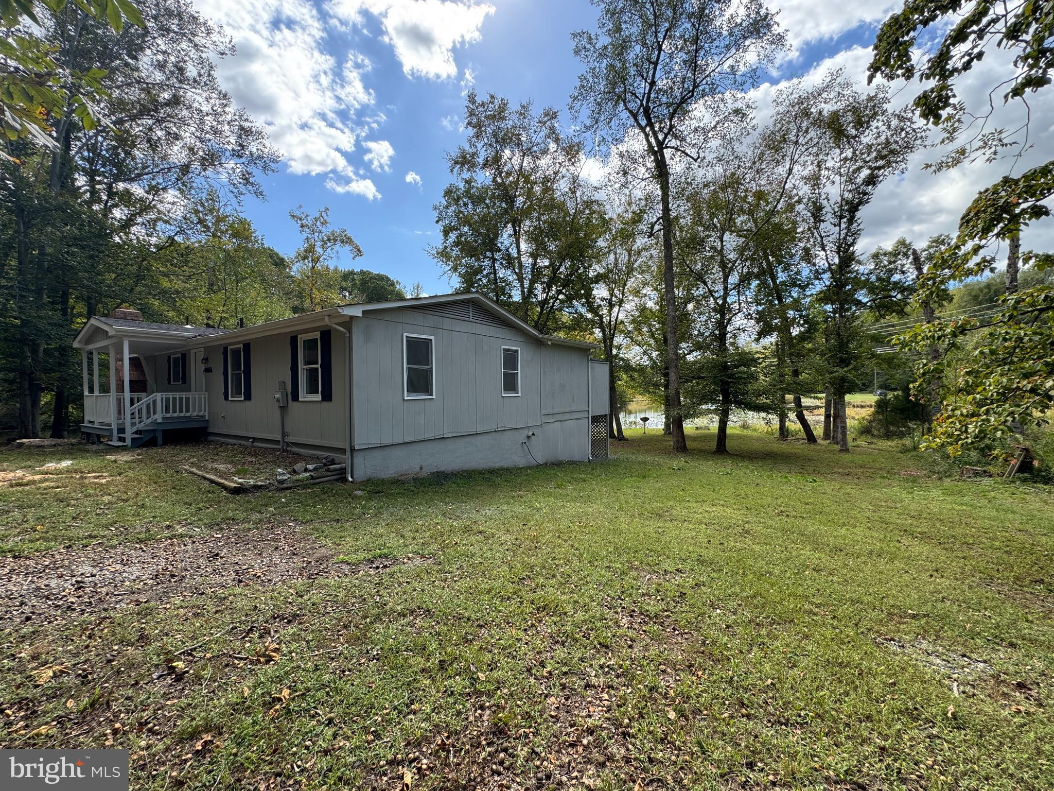 26374 Hill Road Ruther Glen, VA 22546 - Photo 30 of 31 a view of a house with a yard