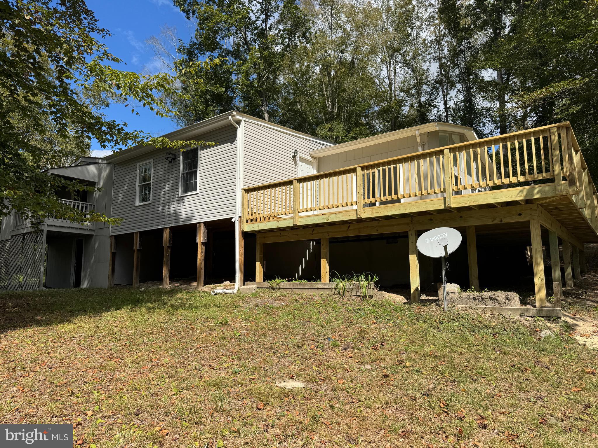 26374 Hill Road Ruther Glen, VA 22546 - Photo 4 of 31 a front view of a house with a yard