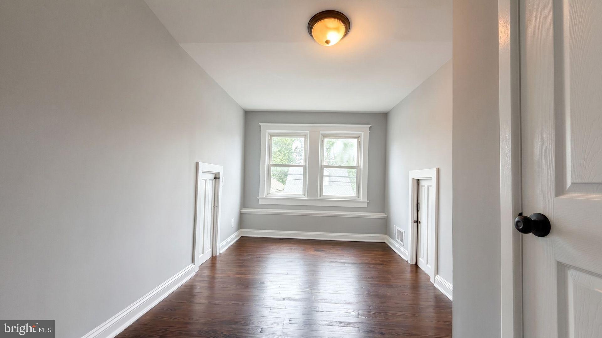 154 Andrew Street Hamilton, NJ 08610 - Photo 20 of 29 a view of livingroom with hardwood floor and window