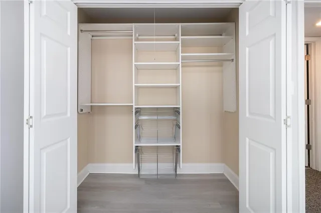 a view of an empty walk in closet