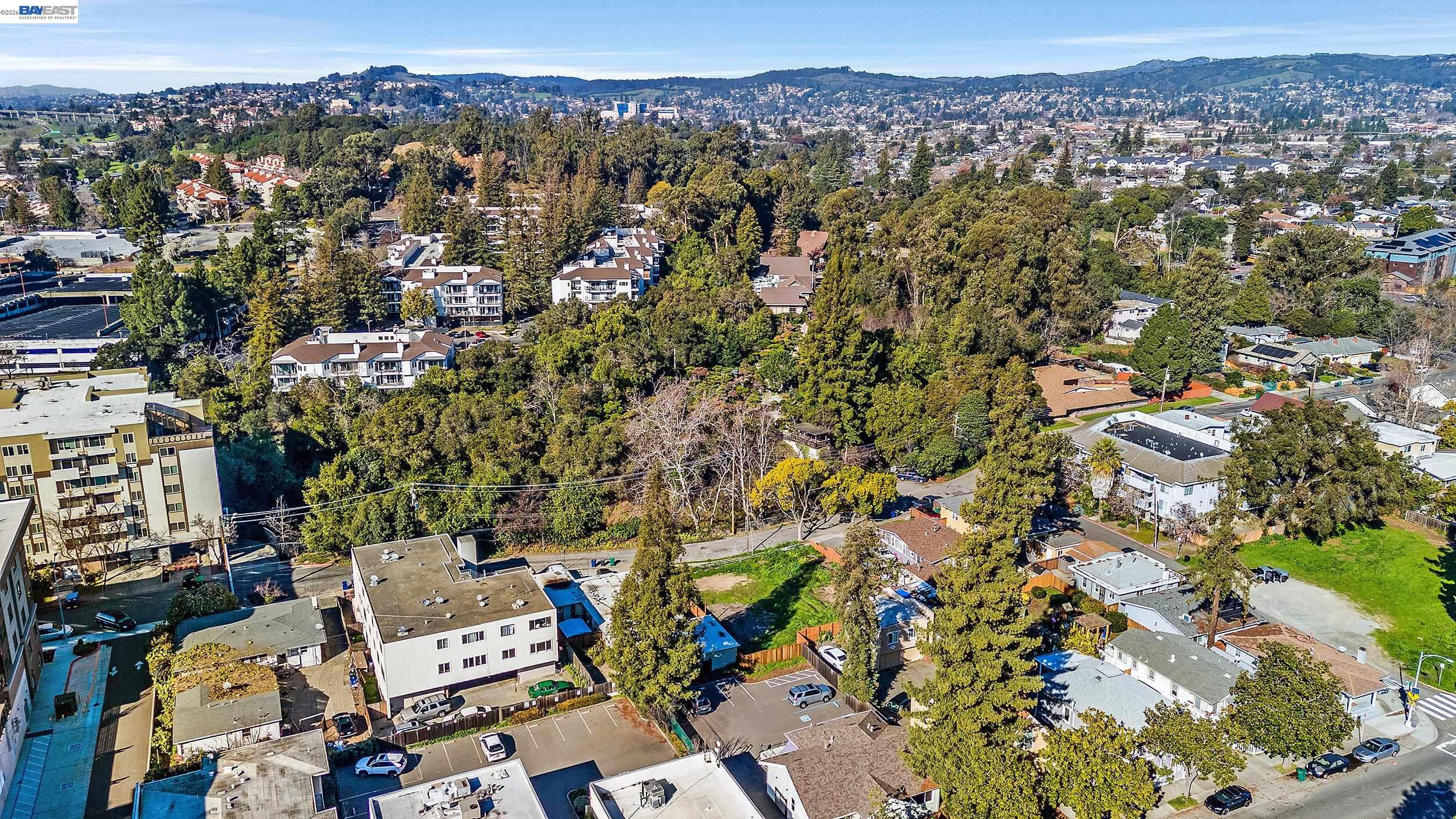 1289 Russell Way Hayward, CA 94541 - Photo 19 of 31 an aerial view of residential house with parking and city view