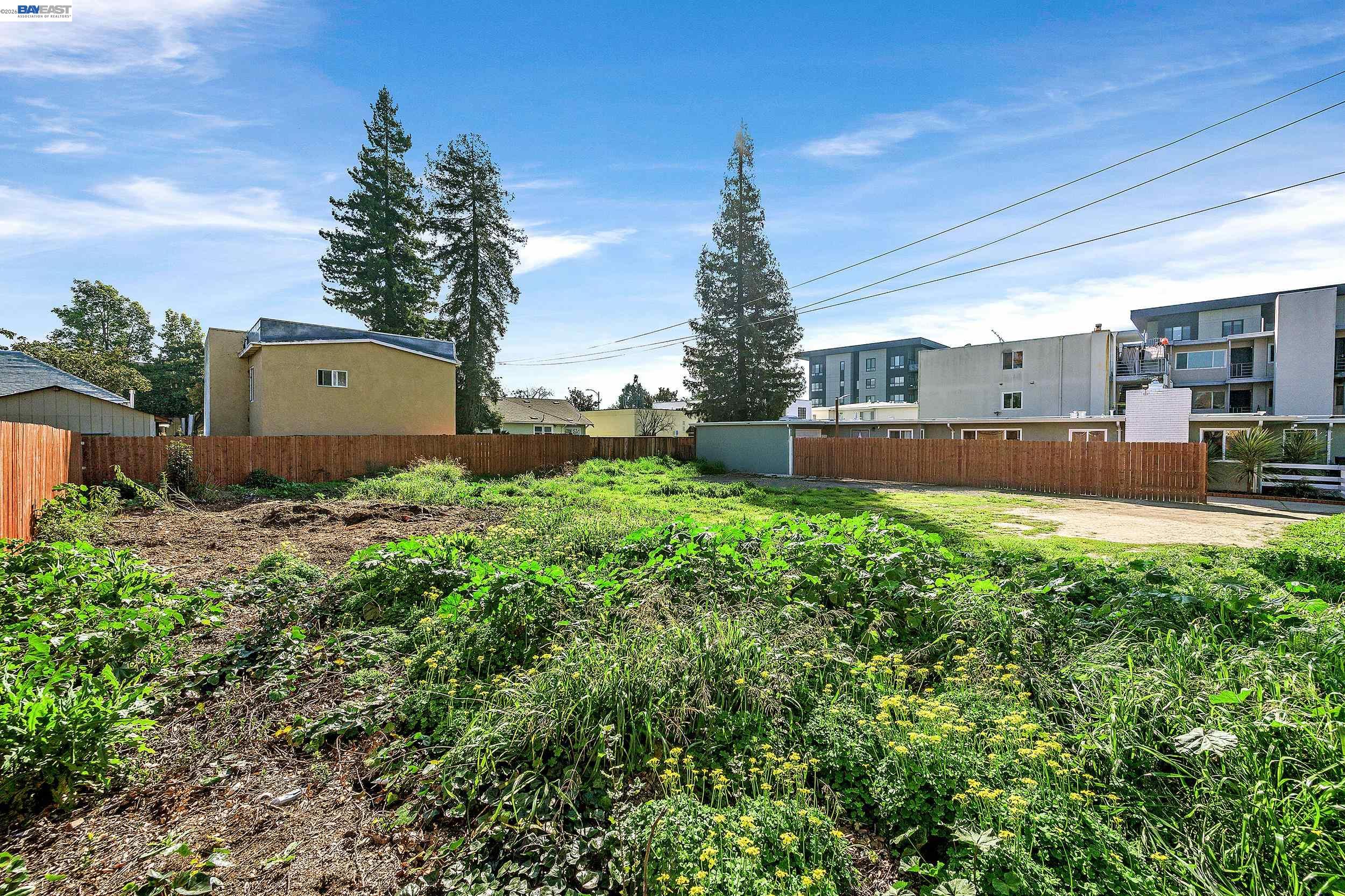 1289 Russell Way Hayward, CA 94541 - Photo 10 of 31 a backyard of a house with table and chairs
