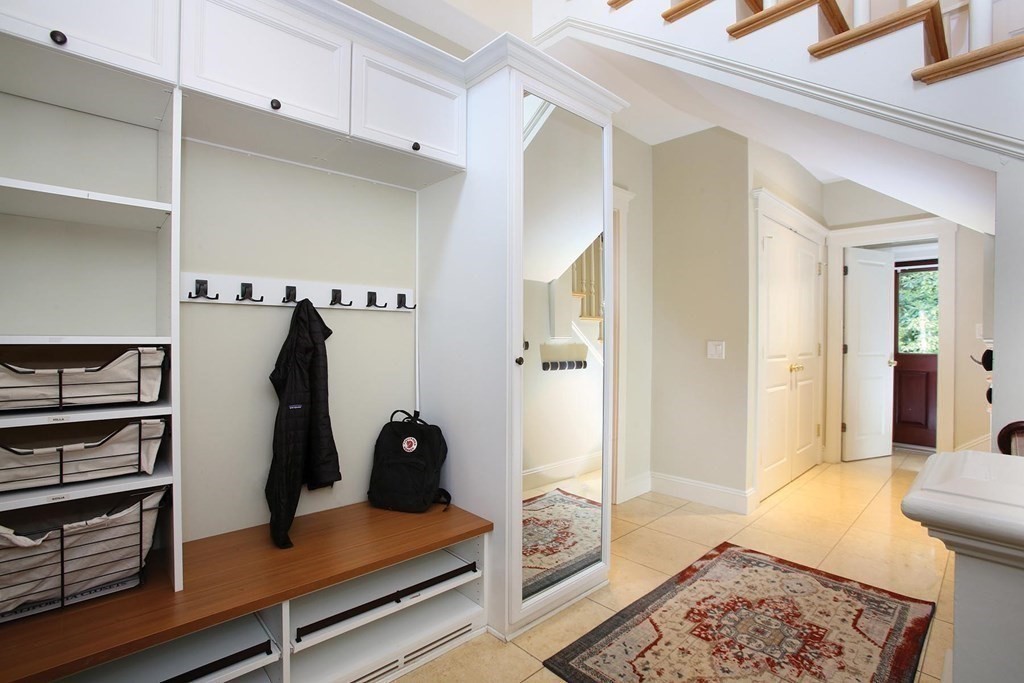 10 Cutter's Bluff Weston, MA 02493 - Photo 16 of 34 a view of walk in closet with clothes and shoes