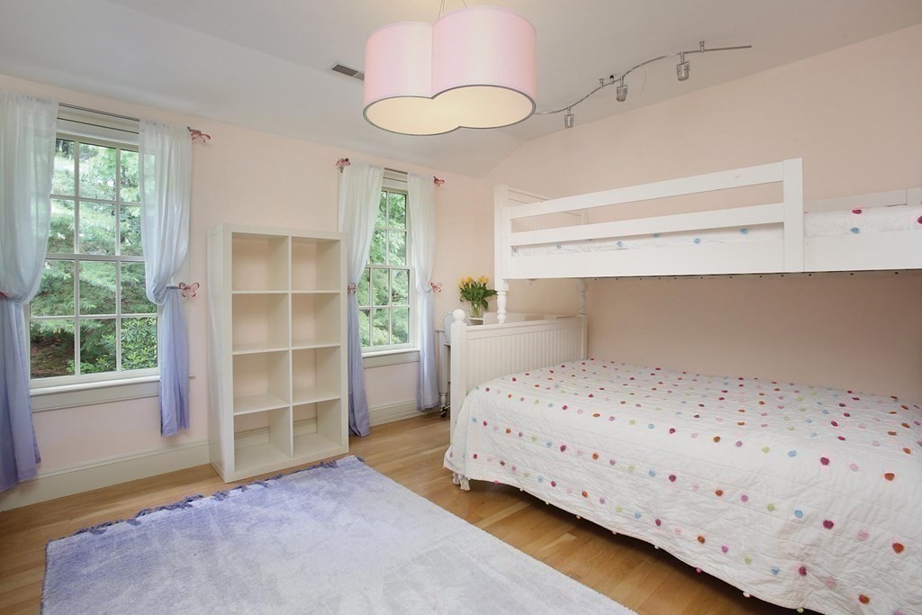 10 Cutter's Bluff Weston, MA 02493 - Photo 23 of 34 a bedroom with a bed and a window