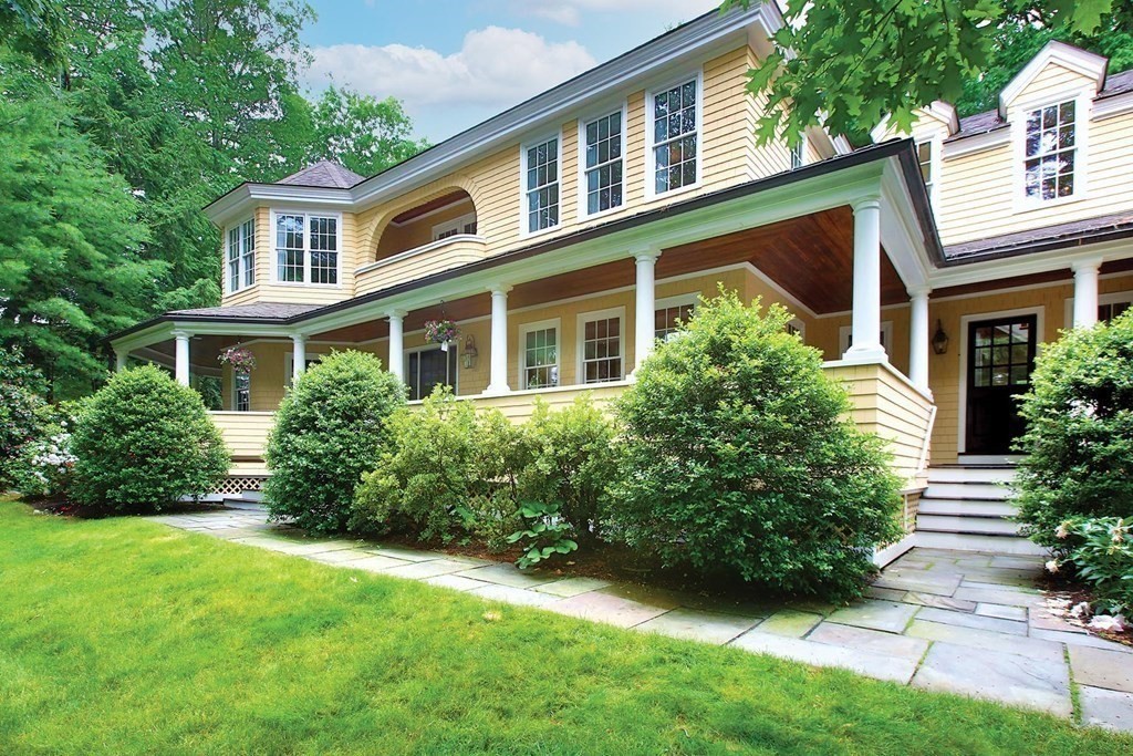 10 Cutter's Bluff Weston, MA 02493 - Photo 3 of 34 front view of a house with a yard