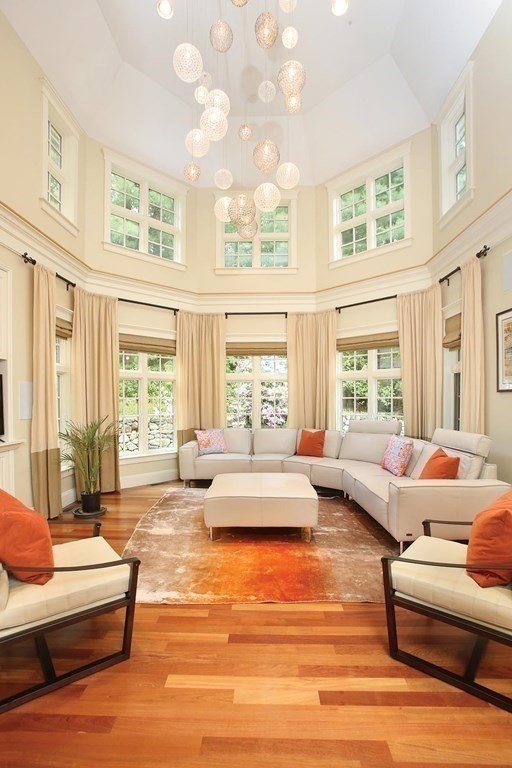 10 Cutter's Bluff Weston, MA 02493 - Photo 7 of 34 a living room with furniture and large windows
