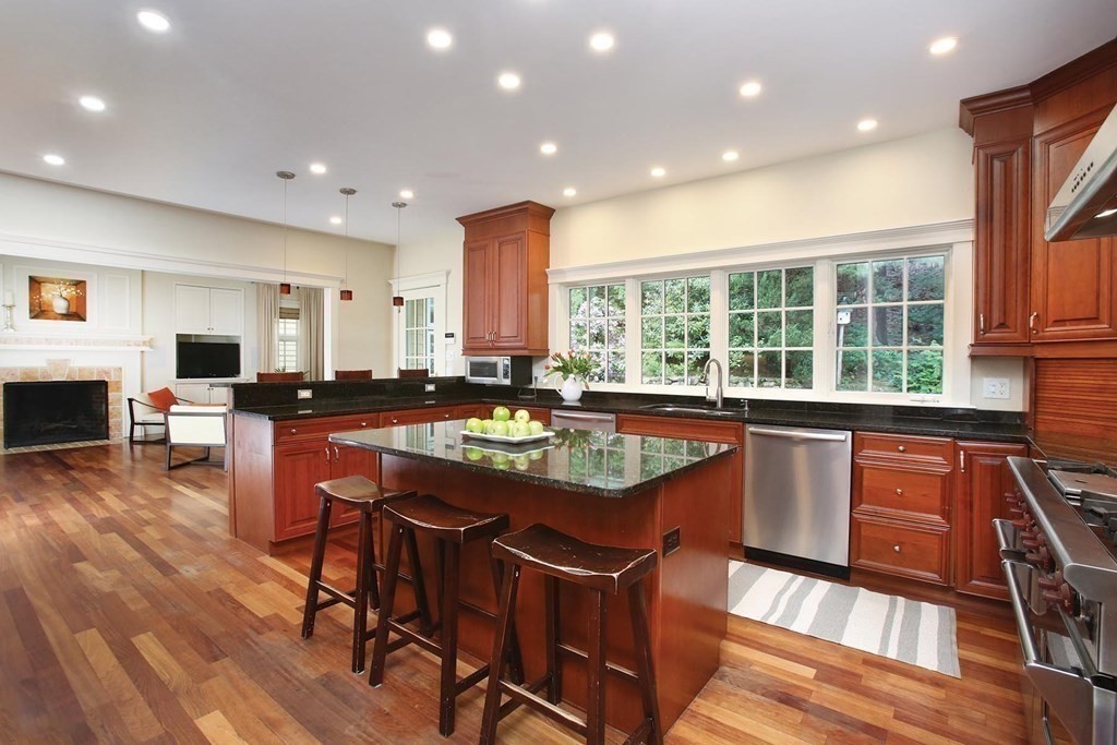 10 Cutter's Bluff Weston, MA 02493 - Photo 9 of 34 a kitchen with stainless steel appliances granite countertop counter space a sink and a refrigerator