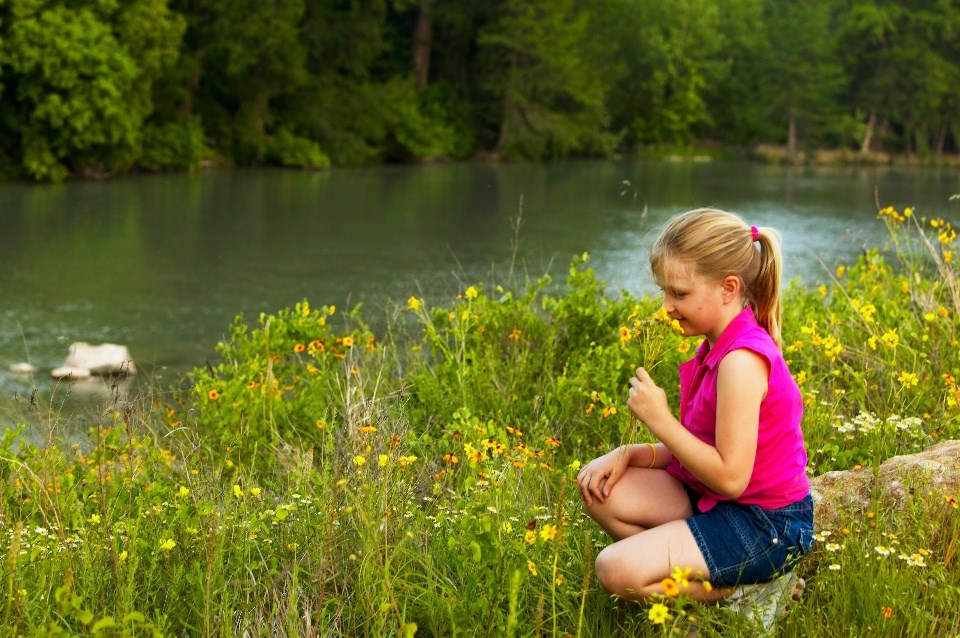 4032 Comanche Trace Drive Kerrville, TX 78028 - Photo 13 of 13 a backyard of a house with lots of green space and lake view