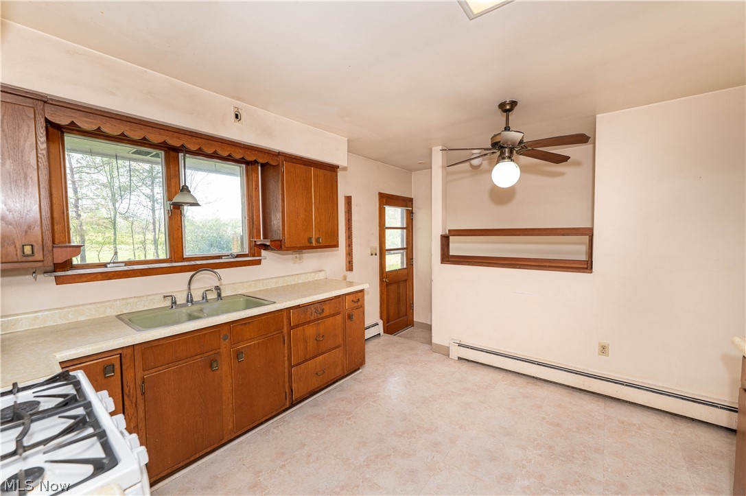 12310 Huntoon Road Painesville, OH 44077 - Photo 8 of 48 Kitchen offers a great a view of the peaceful, secluded backyard