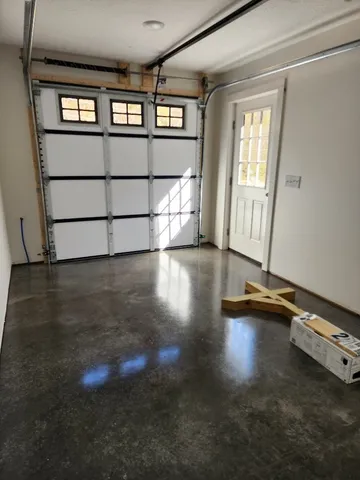 a view of empty room with windows