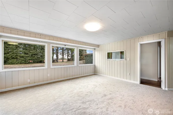 an empty room with windows