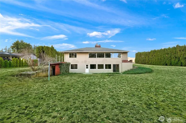 a house view with a garden space