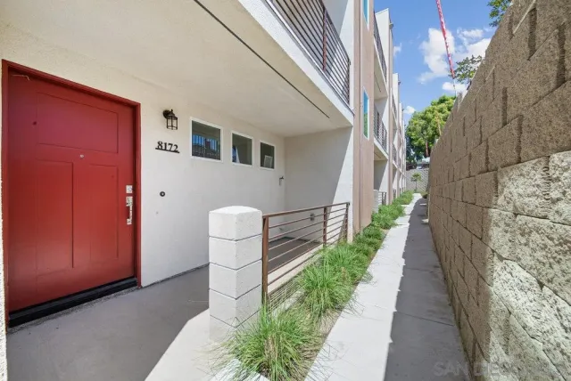 a house view with a garden space