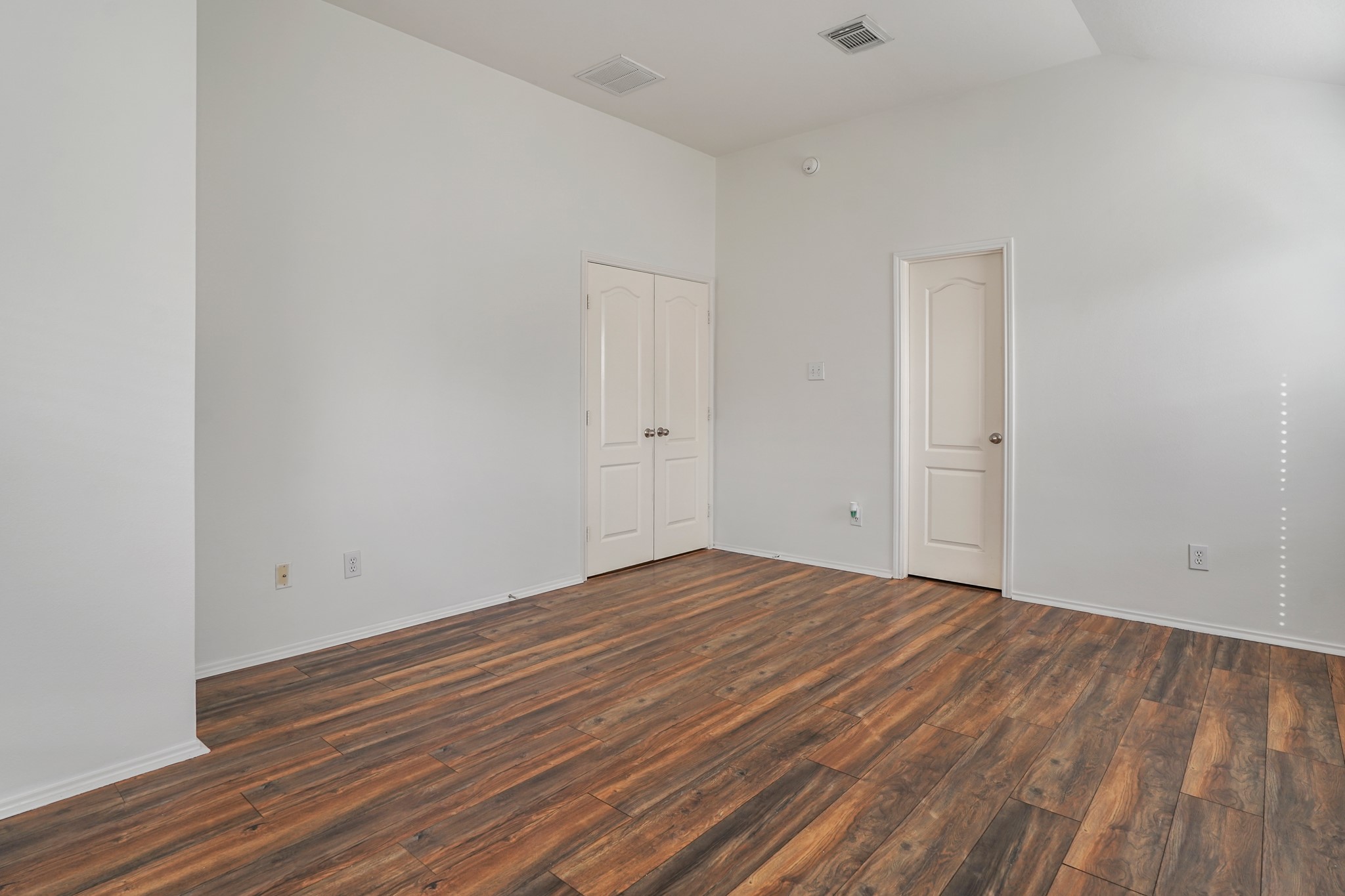 18531 Windy Village Lane Katy, TX 77449 - Photo 12 of 21 a view of empty room with wooden floor