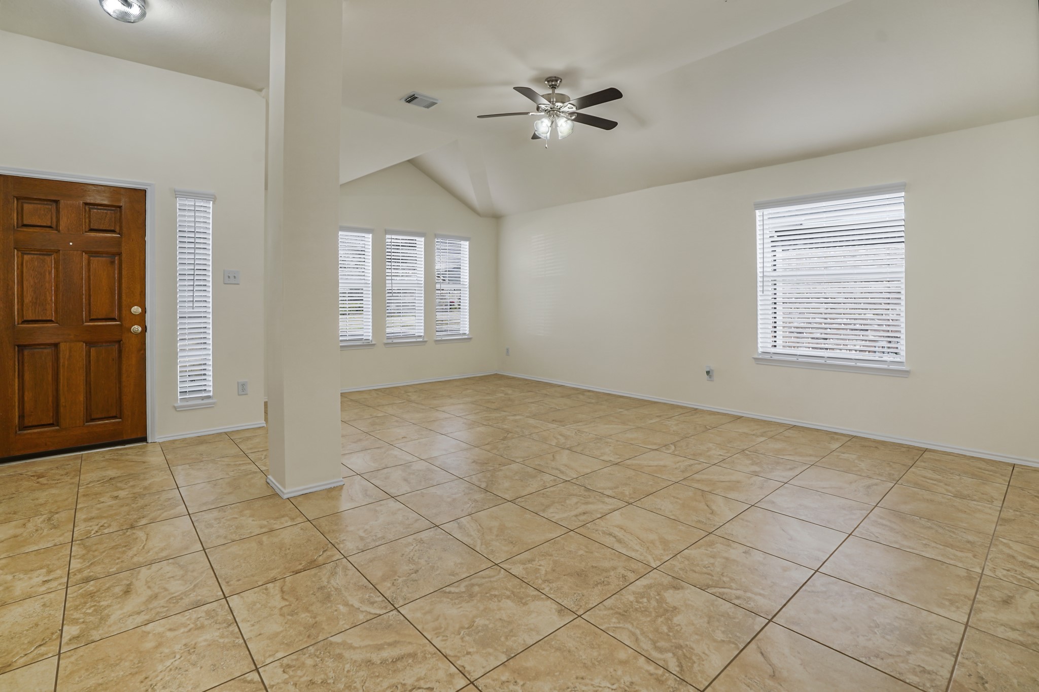 18531 Windy Village Lane Katy, TX 77449 - Photo 9 of 21 a view of an empty room with a window