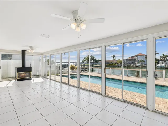 a kitchen with stainless steel appliances a sink and a refrigerator