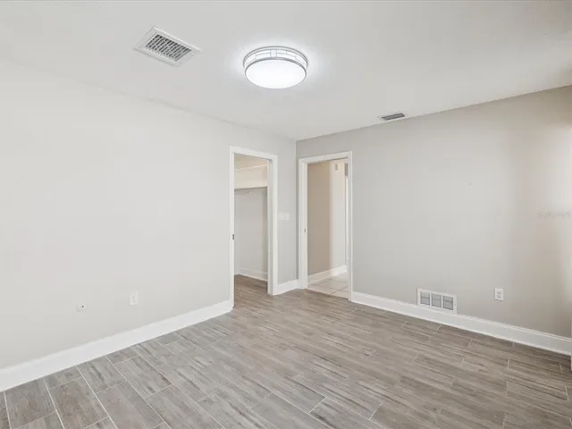a bathroom with a sink a mirror and a shower