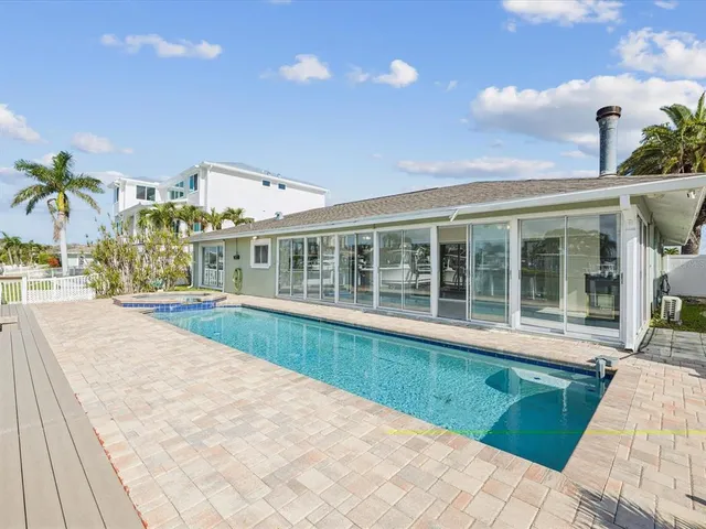 a view of a swimming pool and outdoor space