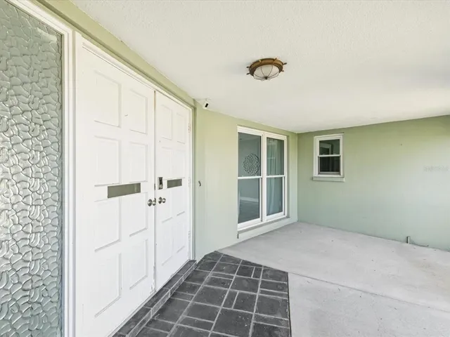 a view of a livingroom with wooden floor
