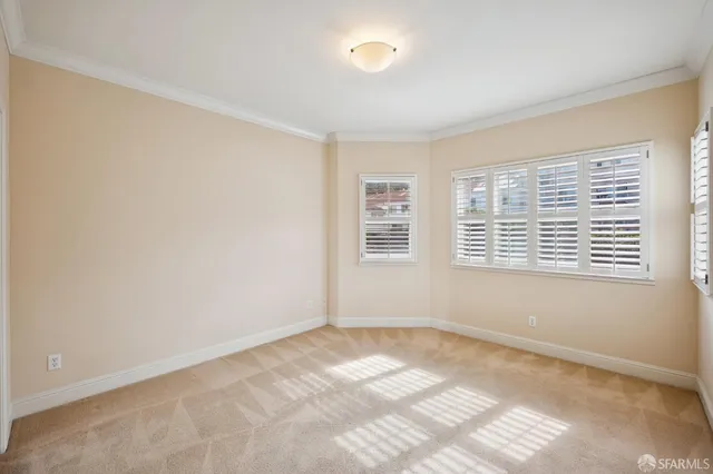 a kitchen with stainless steel appliances granite countertop a refrigerator and a stove